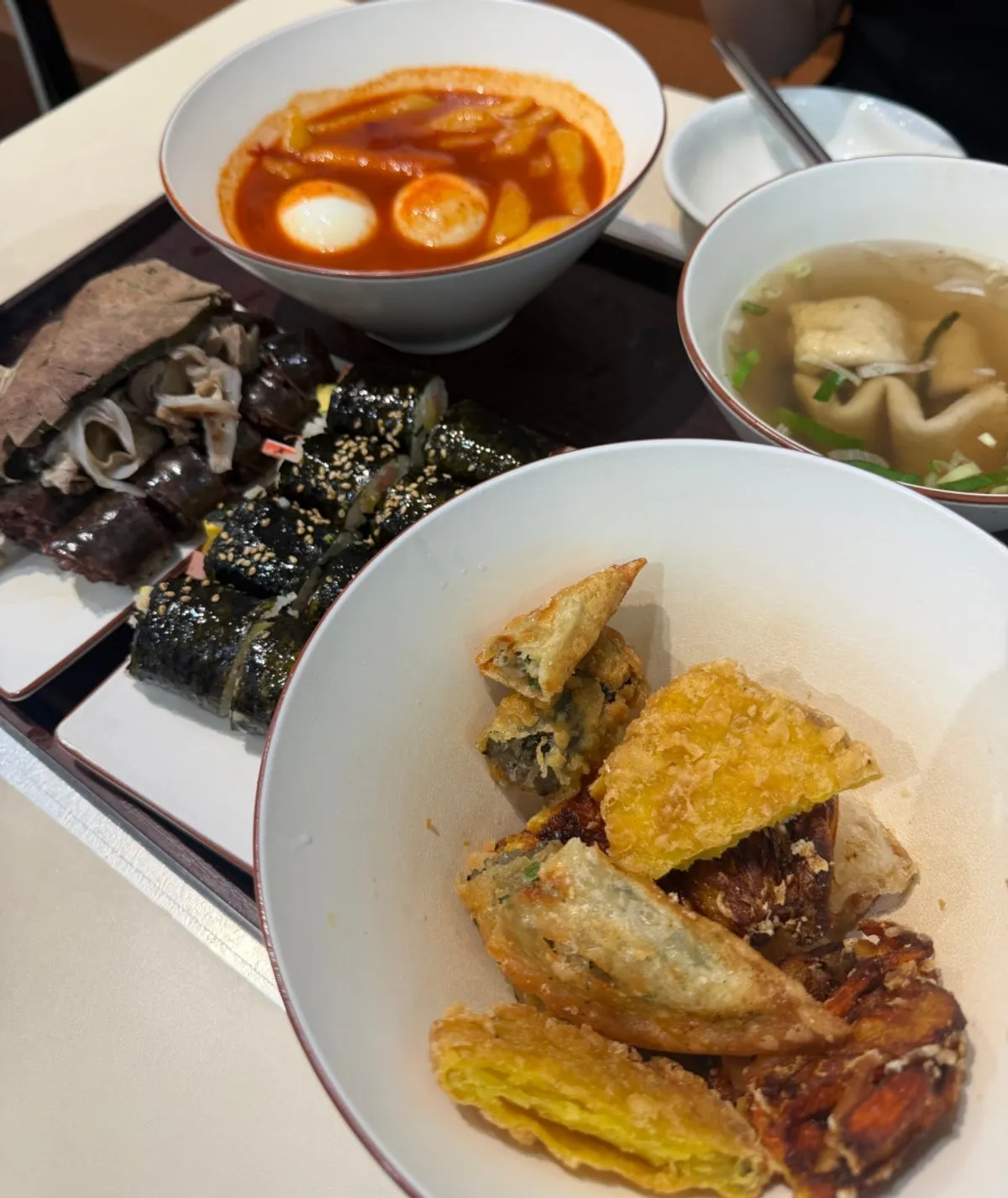 Curly fish cake served with broth