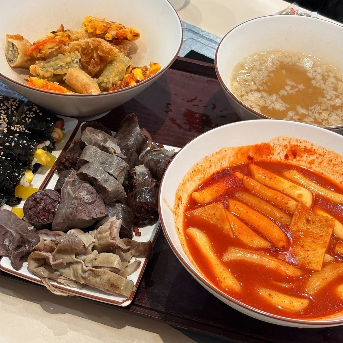 Hyeonseoni Combo Set with tteokbokki, fried snacks, sundae, and gimbap