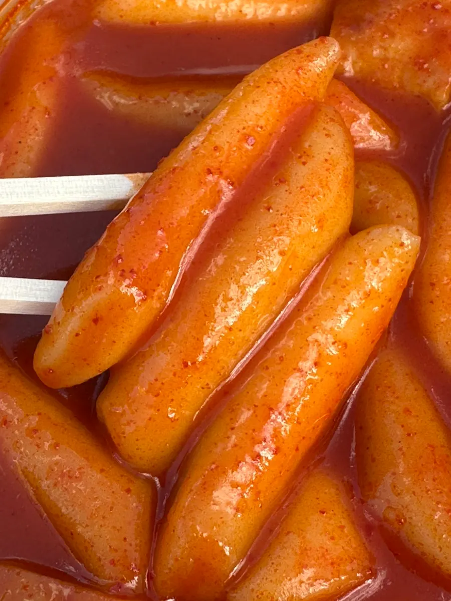 Chewy tteokbokki rice cakes soaked in sauce