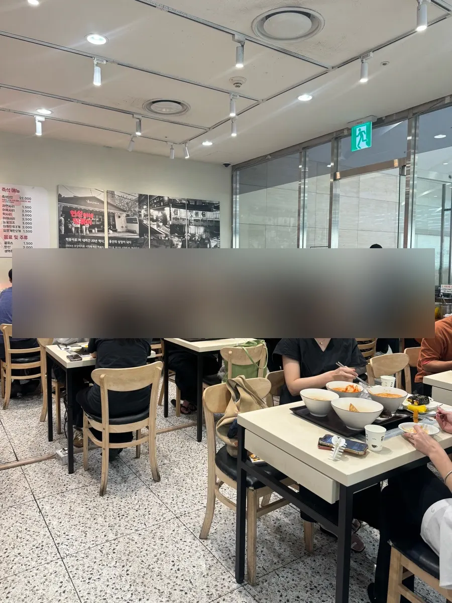 Interior of Hyeonseonine full of diners during evening hours