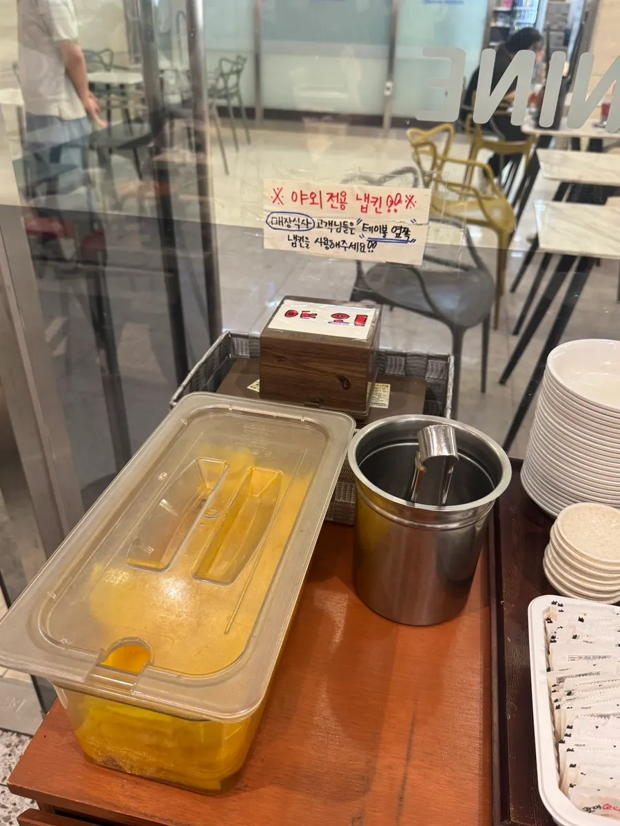 Self-serve bar with spoons and side plates