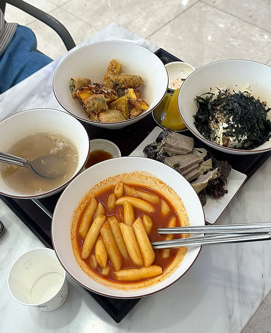 The Hyeonseon-i Set with tteokbokki, sundae, fried snacks, and rice ball