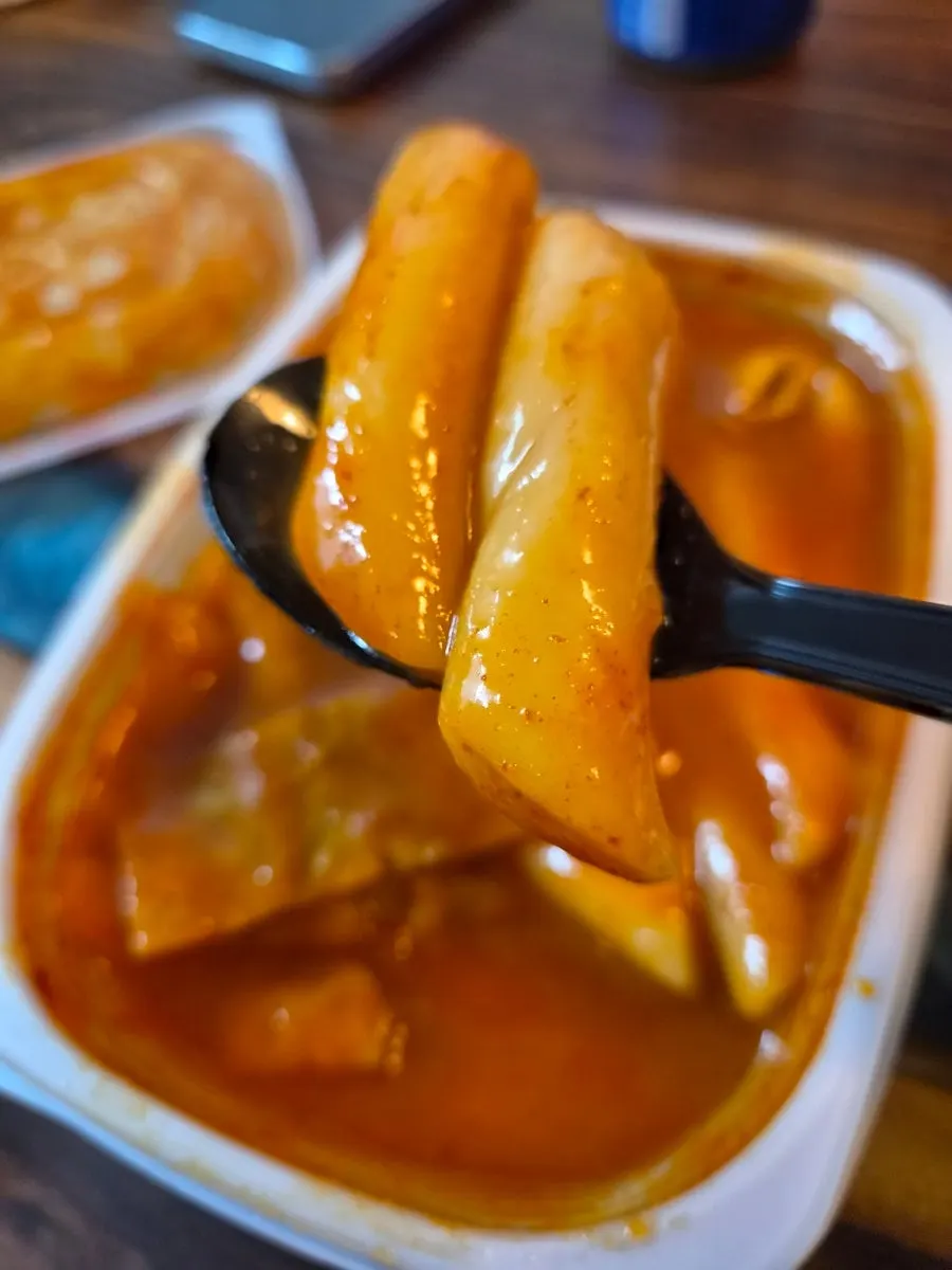 Cold beer paired with the tteokbokki