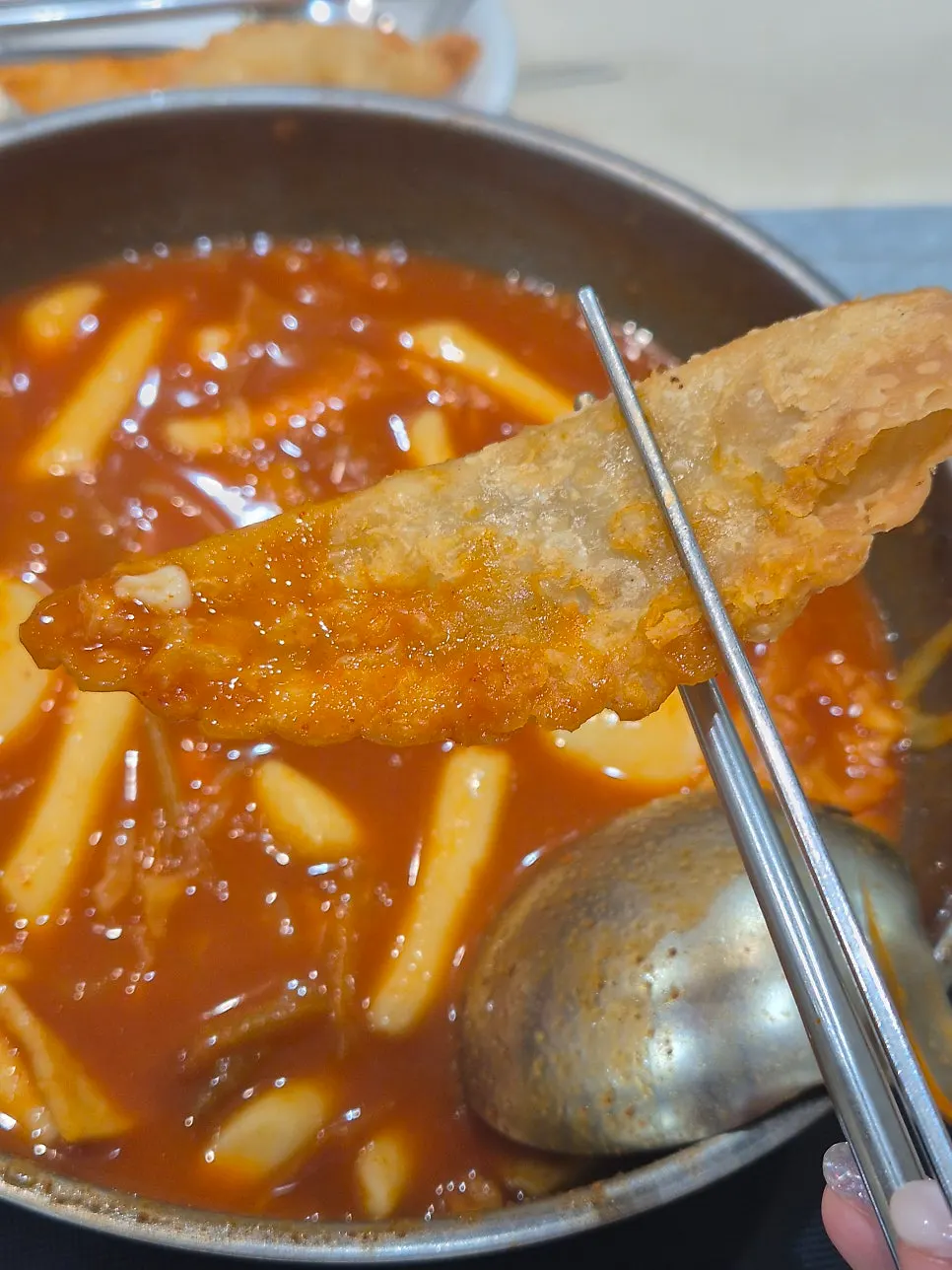 Medium-spice instant tteokbokki simmering in the pot