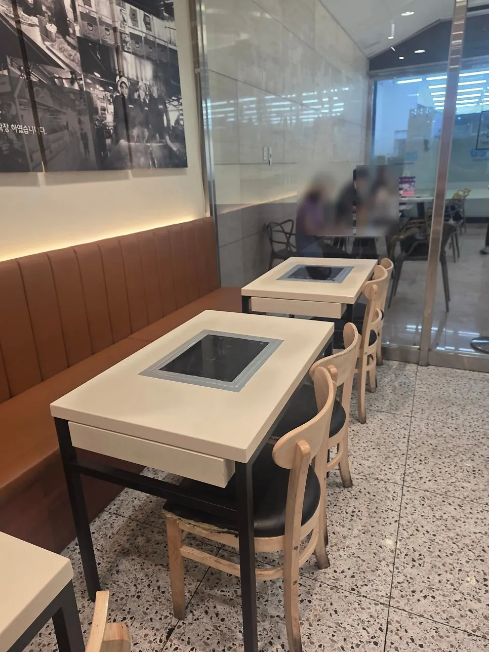 Store tables and chairs with induction burners attached