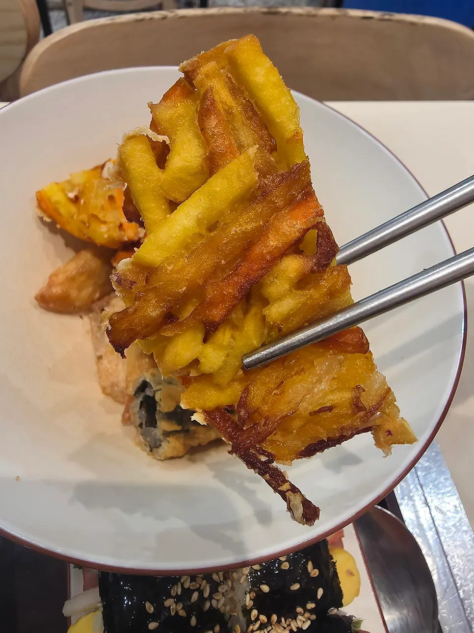 Close-up of sweet potato fritter and gimmari