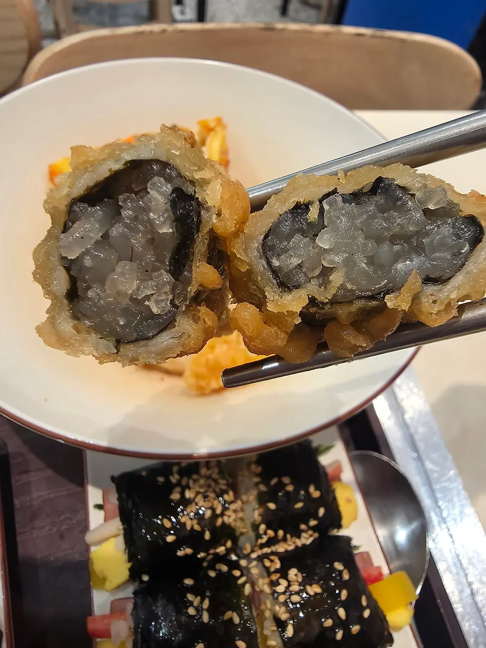 Fritter dipped into tteokbokki broth