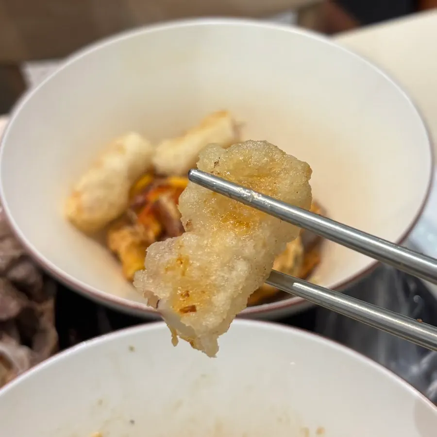 Cross-section of a squid fritter with thick squid inside