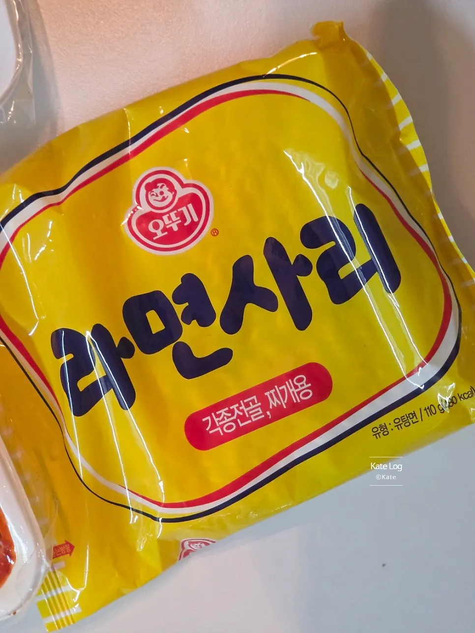 Seasoning sauce pack with cooking instructions attached