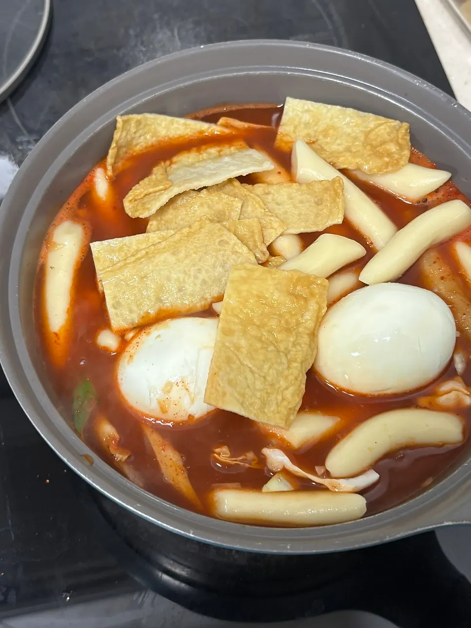 Instant tteokbokki sauce broth starting to boil
