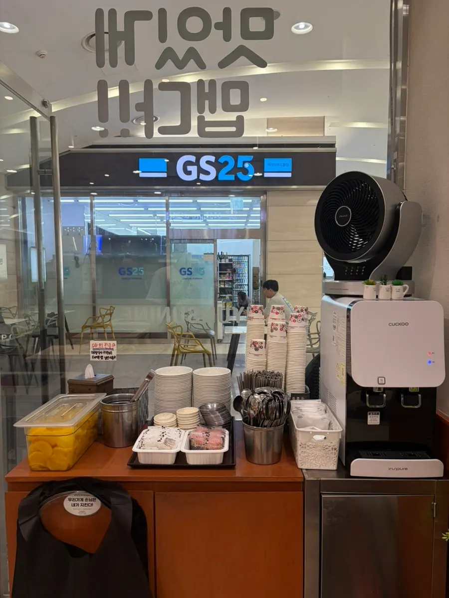 Self-service station for water, cutlery, and cups