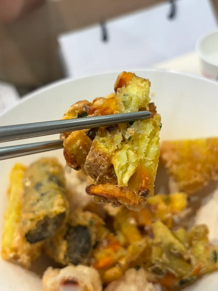 Korean snack spread with soup tteokbokki