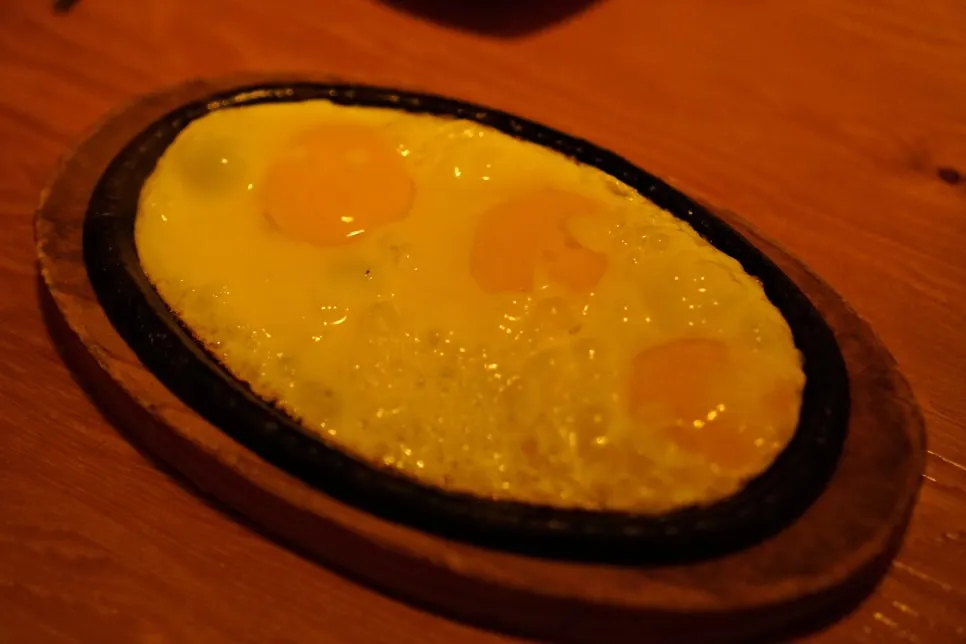 Fried egg served as the house starter