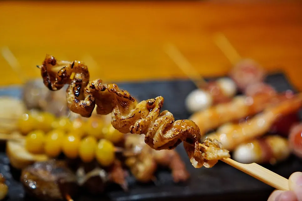 Close-up of chewy chicken heart skewer