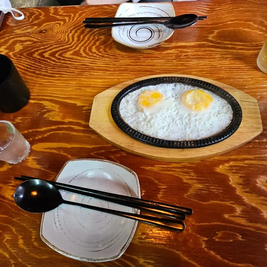 Table with ordered izakaya dishes