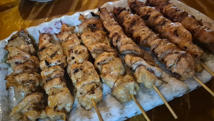 Crispy grilled chicken skin skewer