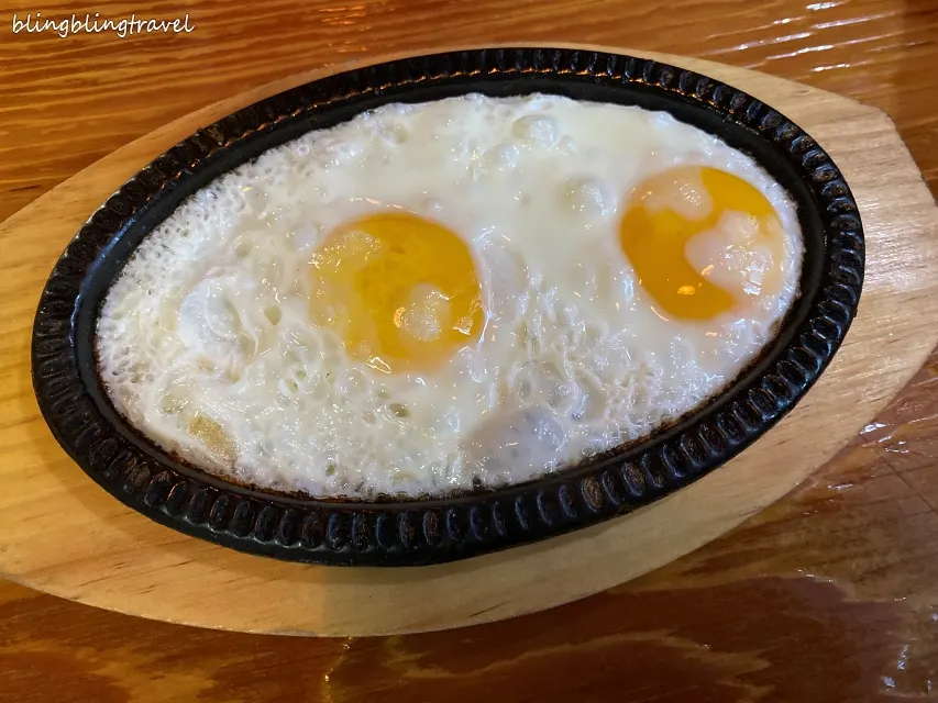 Fried egg cooked on a hot plate