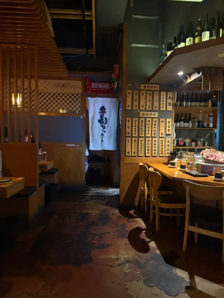 Izakaya seating divided into counter and table sections