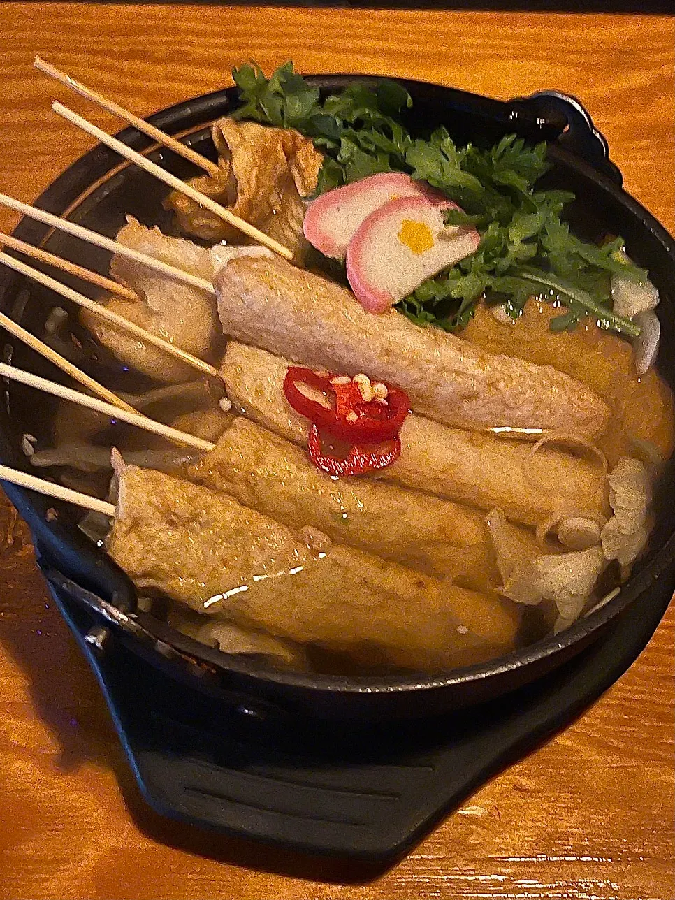 Odeng nabe served in a large earthenware pot