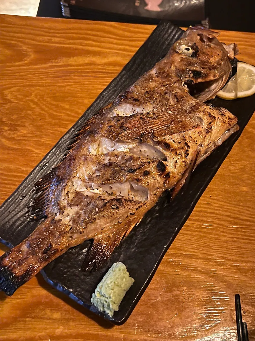 A large grilled atka mackerel