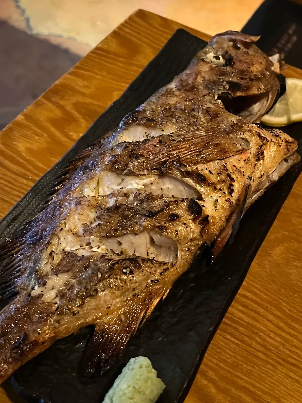 Full view of the charcoal-grilled atka mackerel