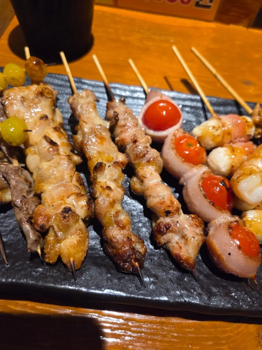 Close-up of skewers with sauce