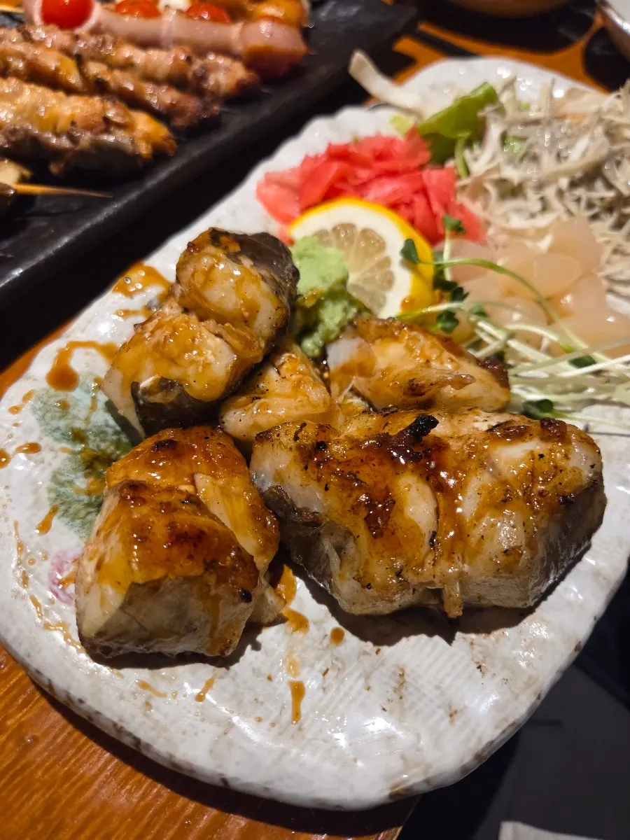 Sea bass packed with flesh, served with sauce