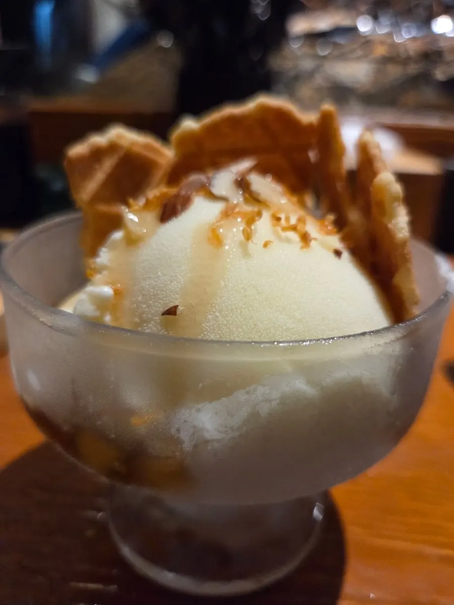 Cheese ice cream dessert topped with a cookie