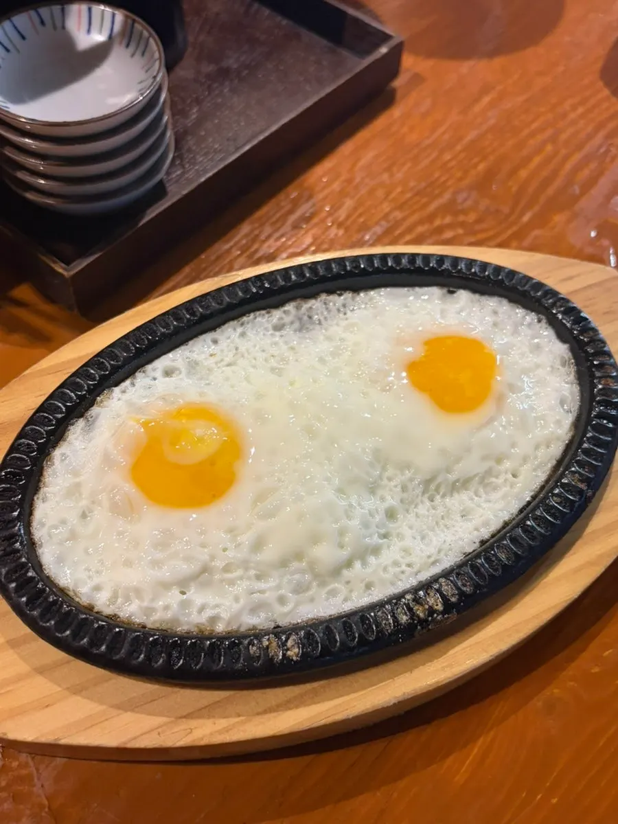 Fried egg served as a basic side dish