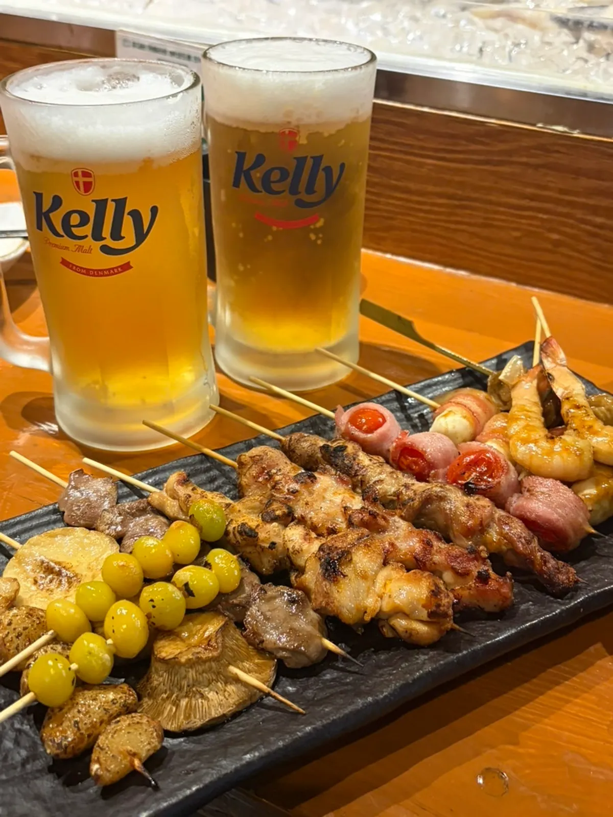 Izakaya table setting with a glass of draft beer