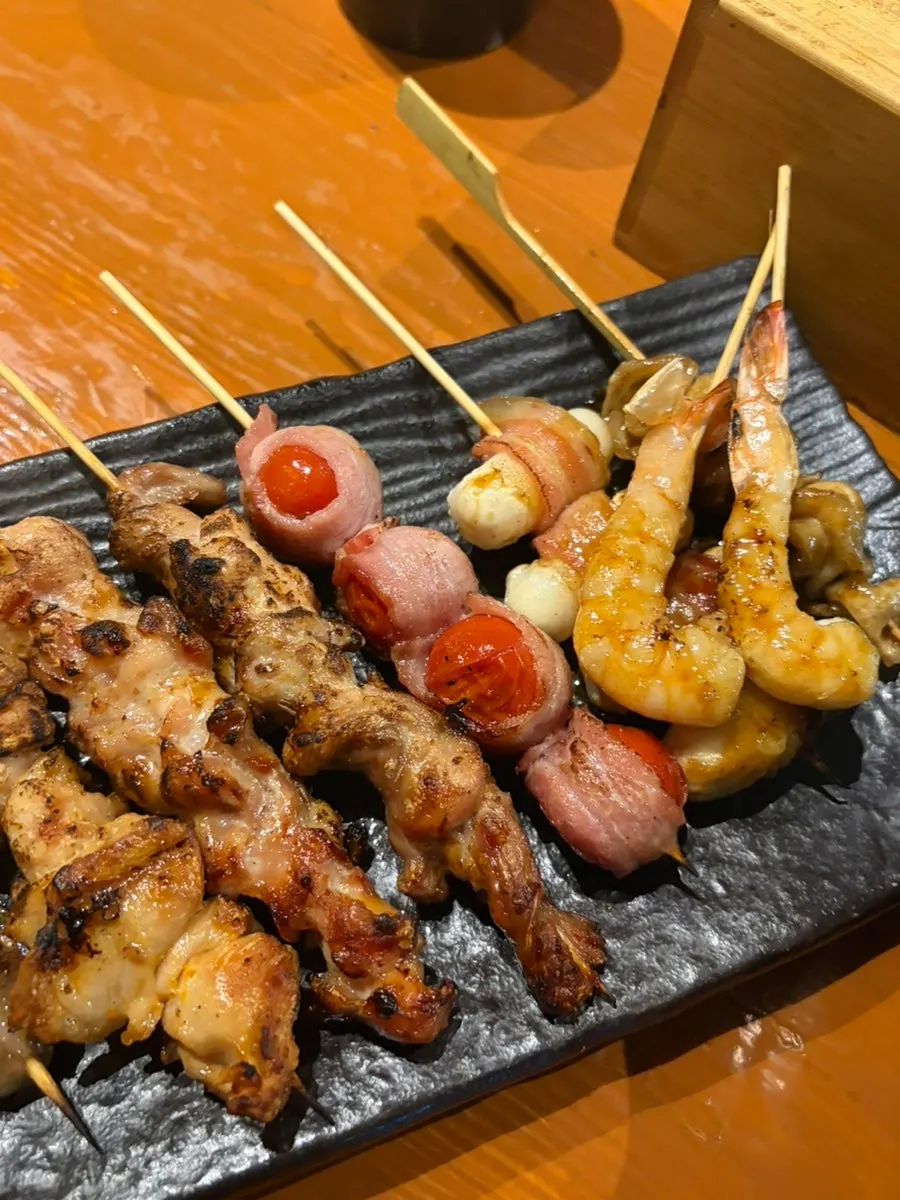 One golden-grilled skewer up close