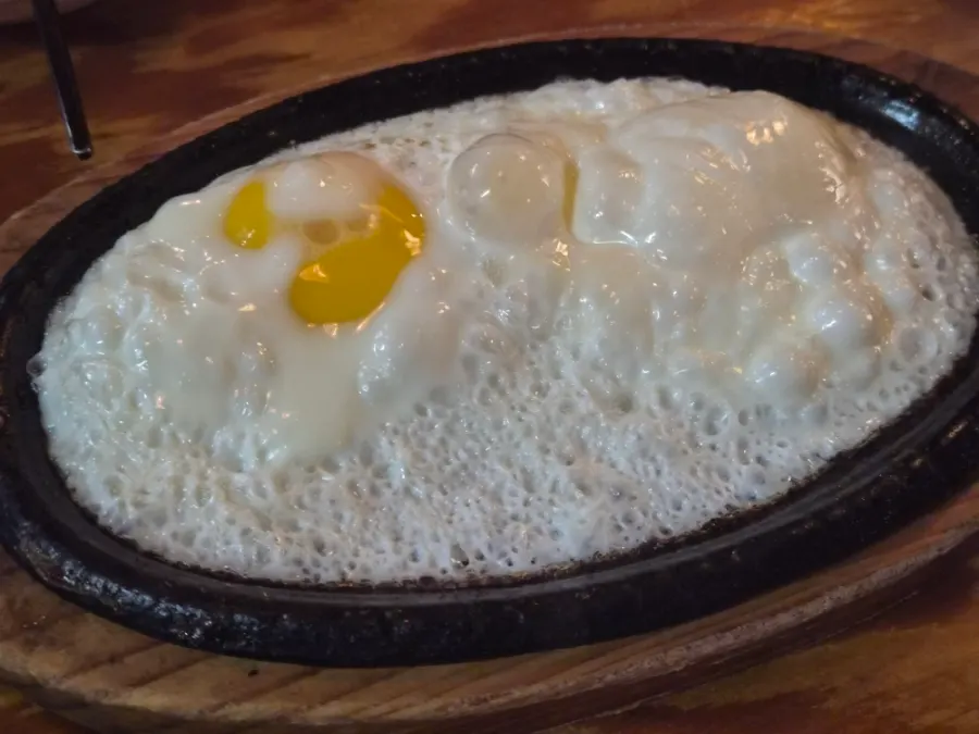 Fried egg served before the main menu