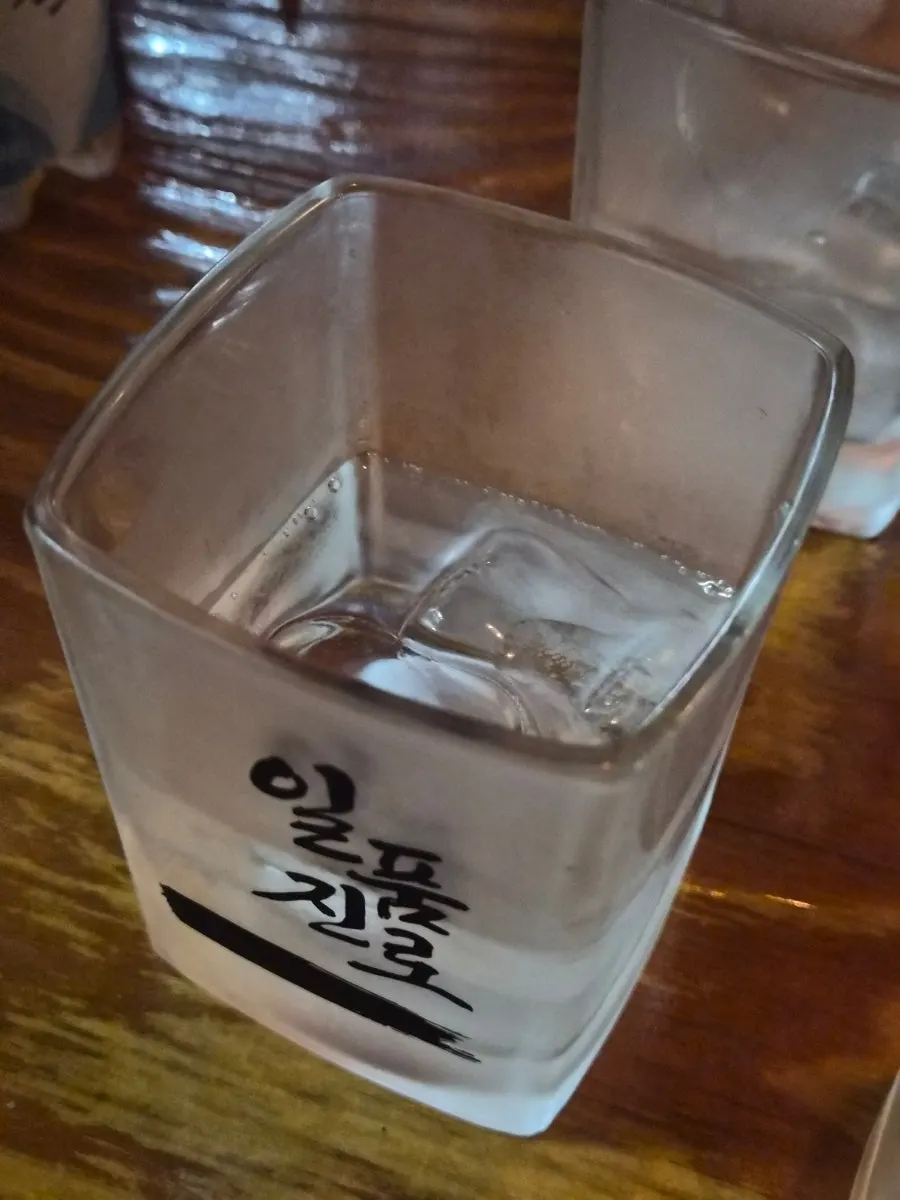 Ilpum Jinro tonic served alongside skewers