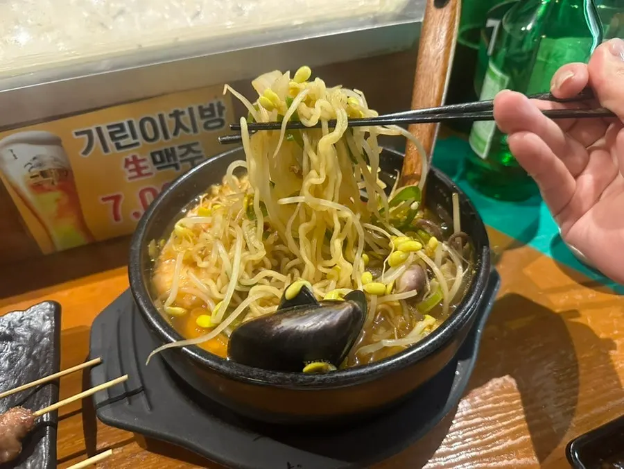 Seafood ramen broth with mussels and shrimp