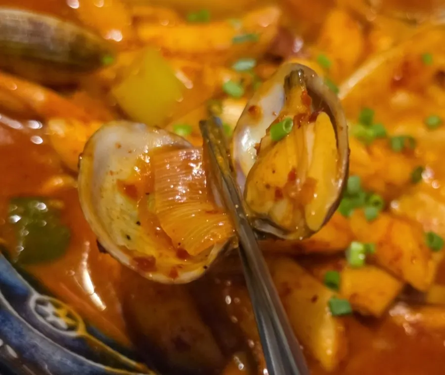 Spicy seafood tteokbokki with seafood mixed in