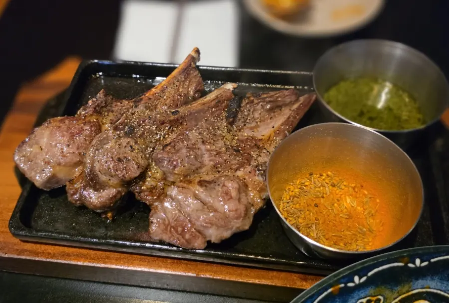 Lamb shoulder rack grilled golden brown