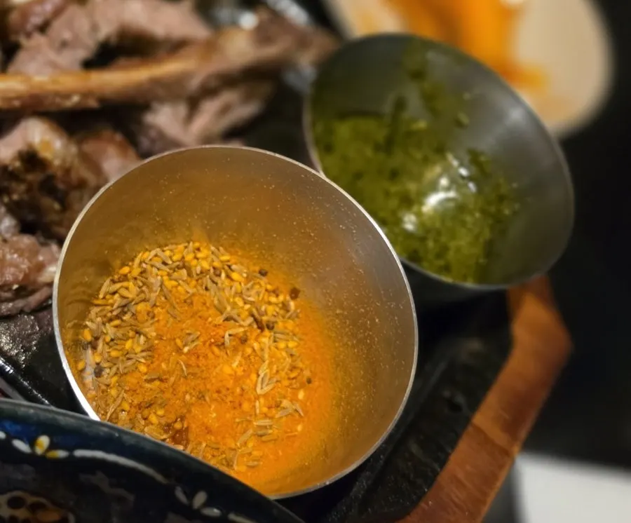 Table with the tteokbokki and lamb combo