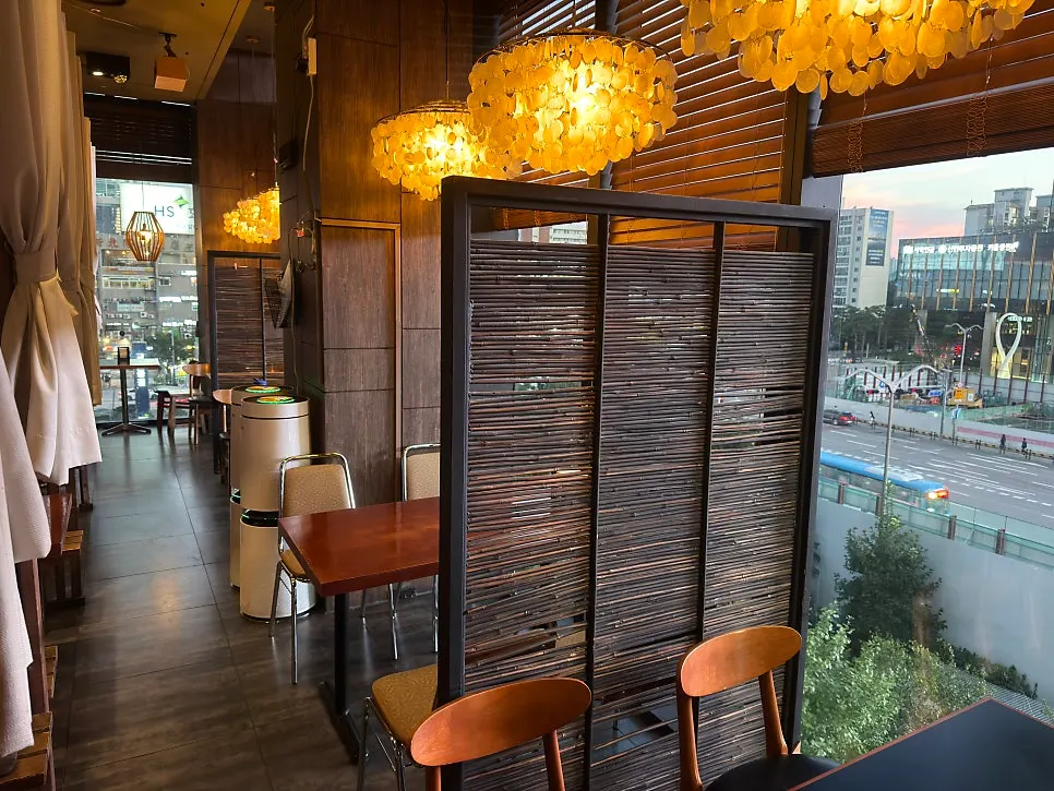 Booth table seat with a curtain