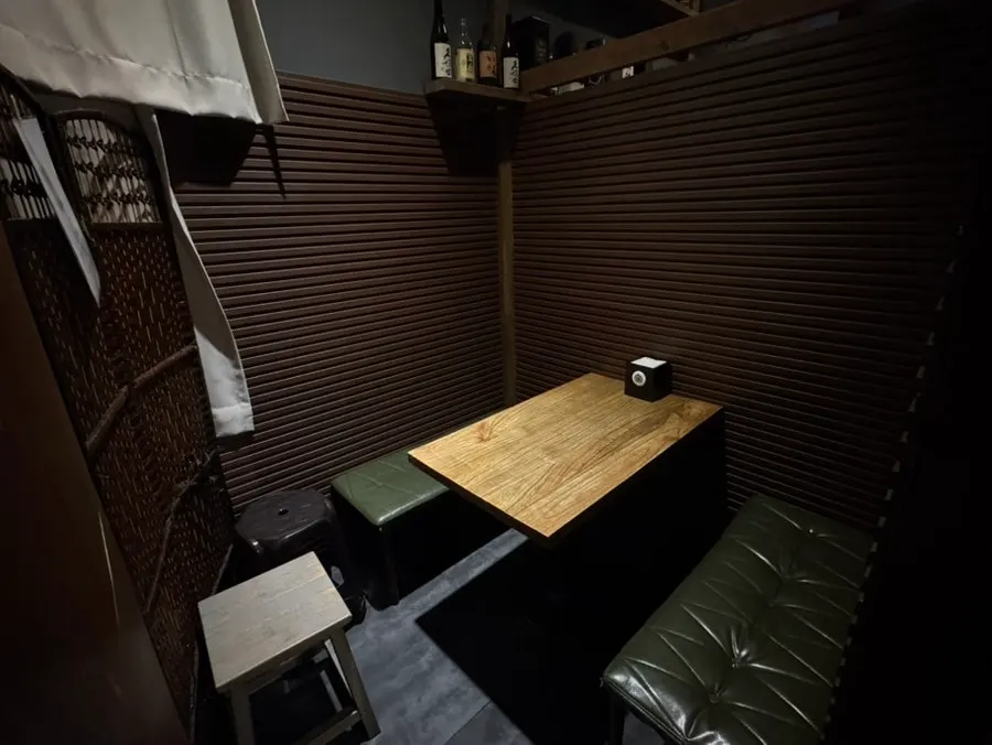 Private seating separated by curtains
