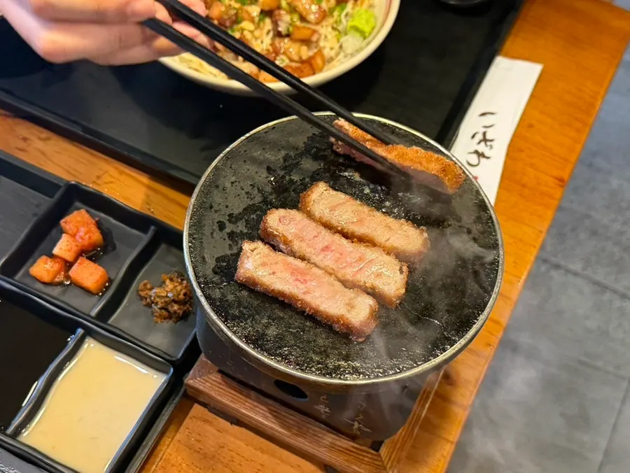 Only as much gyukatsu as needed grilling on the charcoal