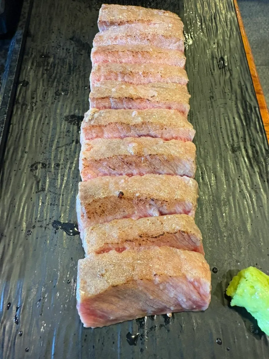 Raw striploin steki served before grilling