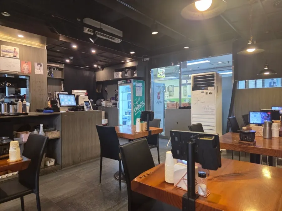 Celebrity autographs displayed above the counter