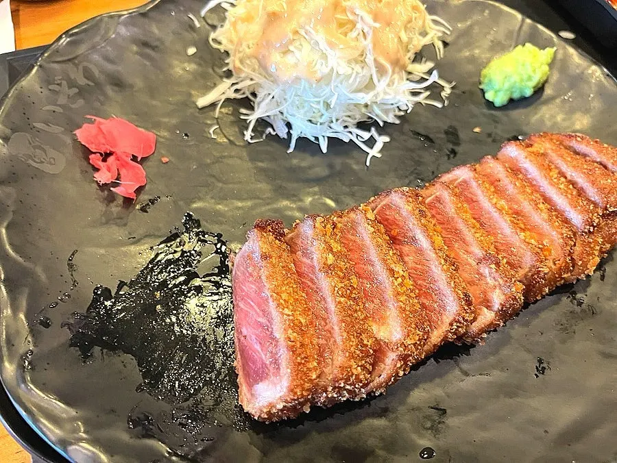 Cross-section of gyukatsu, crispy outside and juicy inside
