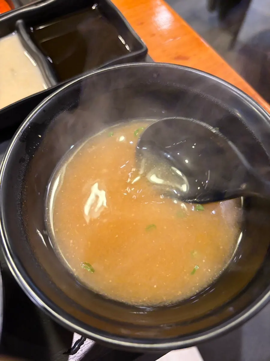 Warm broth served with the gyukatsu set