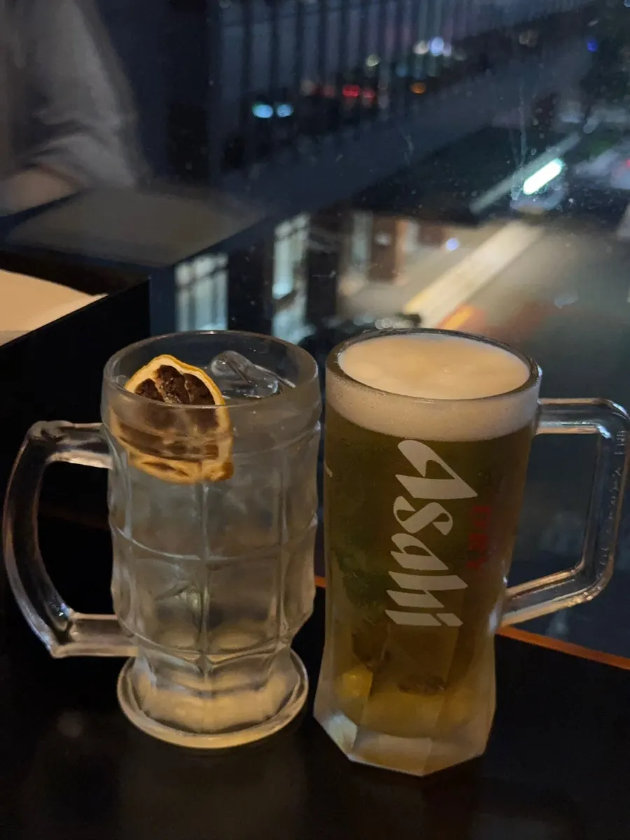 Tonic highball and Asahi draft beer