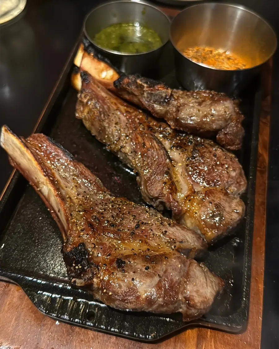 Golden-brown grilled lamb shoulder rack