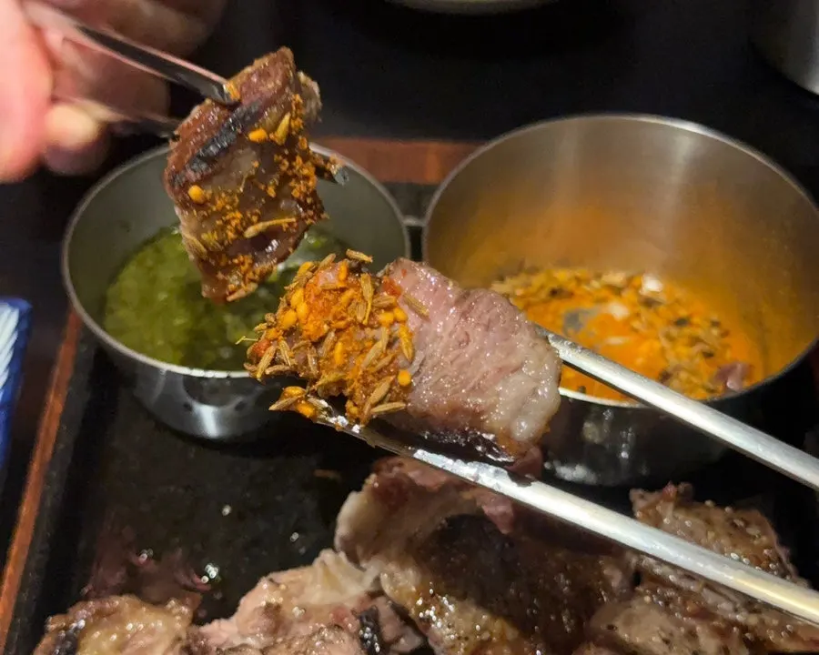 Lamb shoulder rack served piping hot