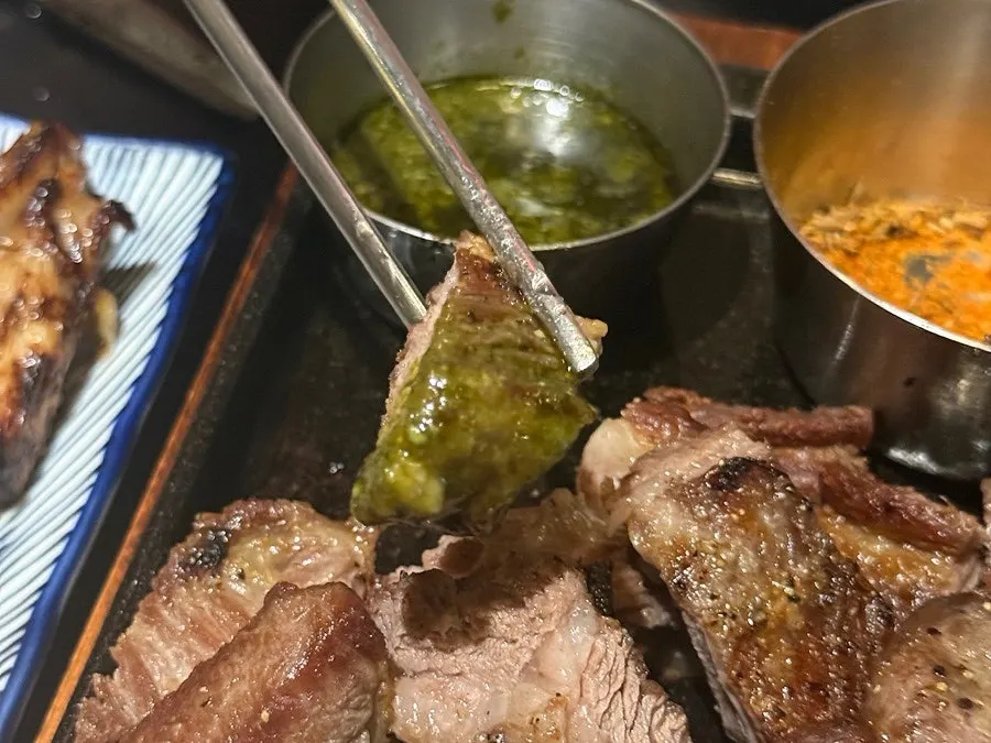Lamb served with basil and cumin sauces