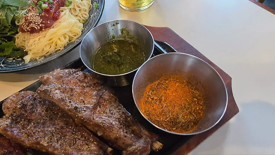 Cumin and basil oil sauce served with the lamb
