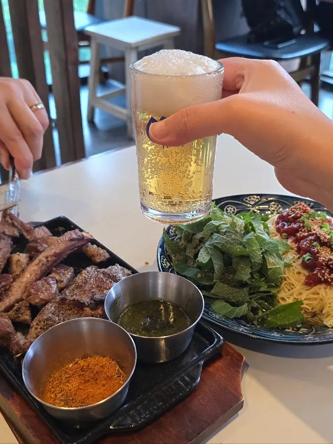 A softly grilled piece of lamb shoulder rack